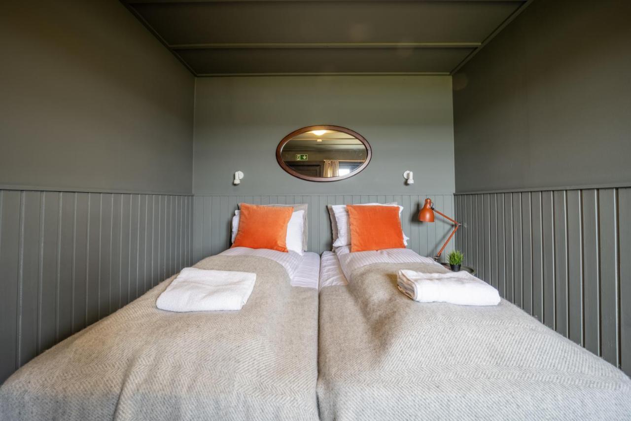 Riverfront Lodge Hella Bagian luar foto